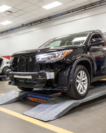 Toyota on vehicle lift | Universal Toyota in San Antonio TX