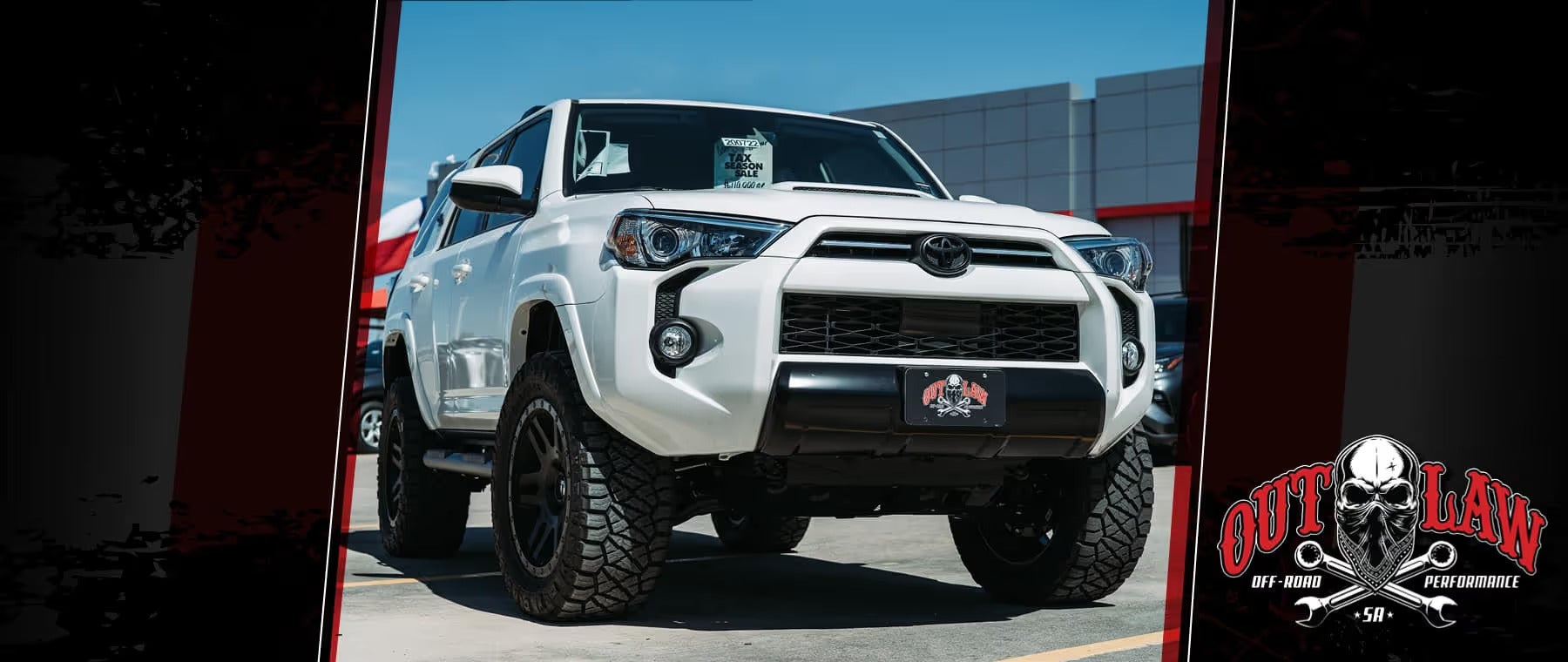 Lifted white Toyota 4Runner with off-road tires at Outlaw Off-Road